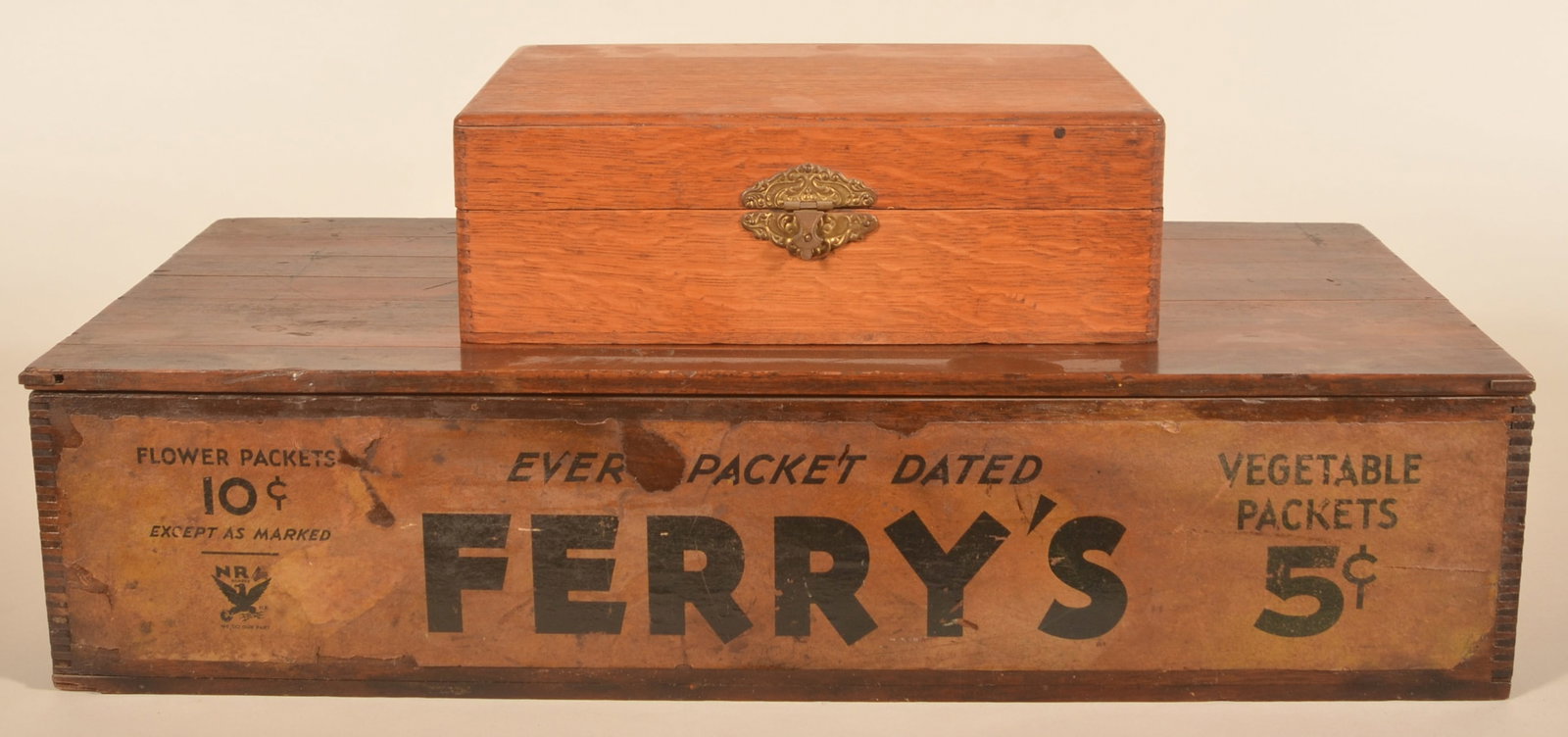 Two DM Ferry Detroit MI Flower Seed Display Boxes: Larger display with paper label on front and label on interior lid explaining how to set up a display. Smaller oak box with colorful label for Ferry Seeds. Both boxes contain many seed packets. Proven