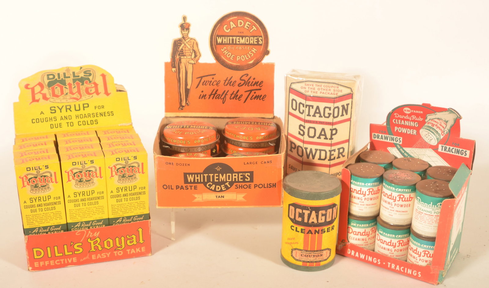 Vintage Country Store Advertising Product Displays: Three NOS counter displays. Whittemore's Cadet Shoe Polish cardboard display with ten advertising tins. Dill's Royal cough syrup cardboard display with twelve unopened boxes which include glass
