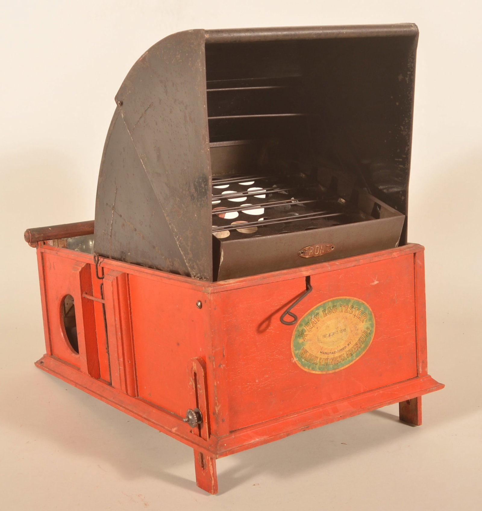 Rare Wood & Tin 19th C. Poultry X-Ray Egg Tester: One of my favorite items in this sale is this excellent machine, invented as a more efficient way to "candle eggs". Patented Nov. 15, 1898. Wood box in the original red paint. A metal hood and tray wi