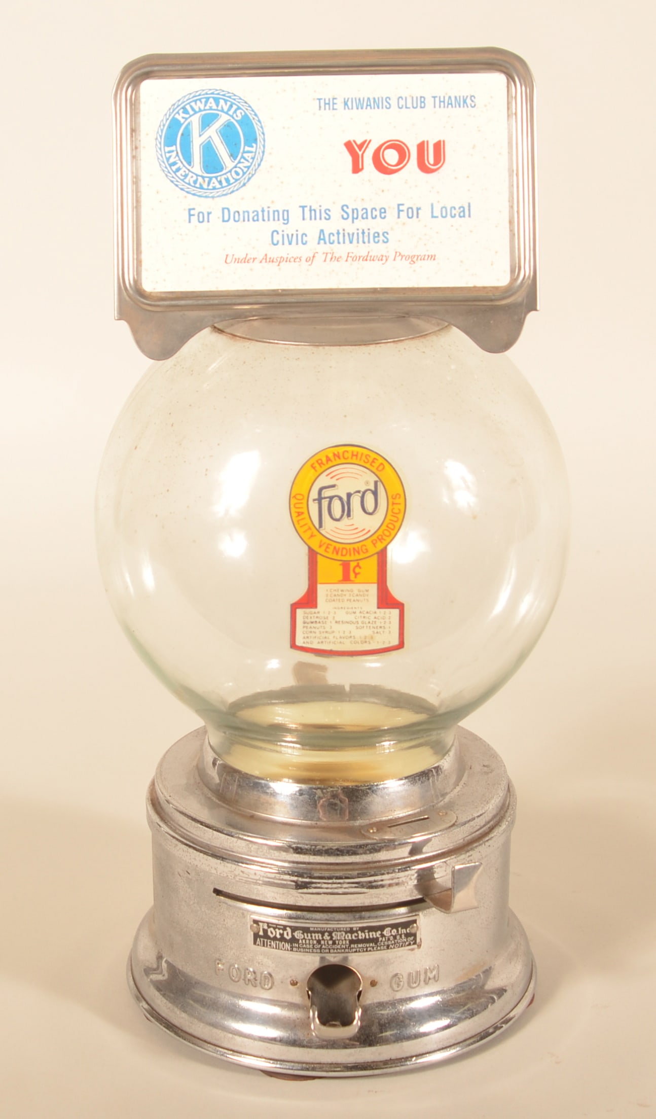 Ford Bubblegum 1 Cent Coin-Op Vending Machine: Chrome base with maker's tag from Akron, NY. Marquee with advertisement for support of the Kiwanis Club. Provenance: The collection of Russell and Darlene Snyder. 15 1/2"H