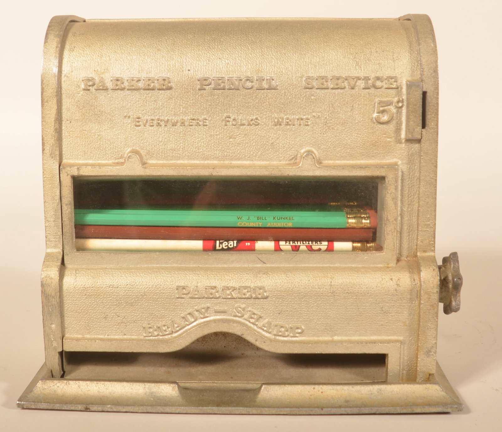 Parkers Pencil Service 5 Cent Coin-Op Machine: Small countertop vending machine made by the Parker Pencil Service, ca. 1930, in a silver, painted finish. Provenance: The collection of Russell and Darlene Snyder. 9"H x 10 1/4"W