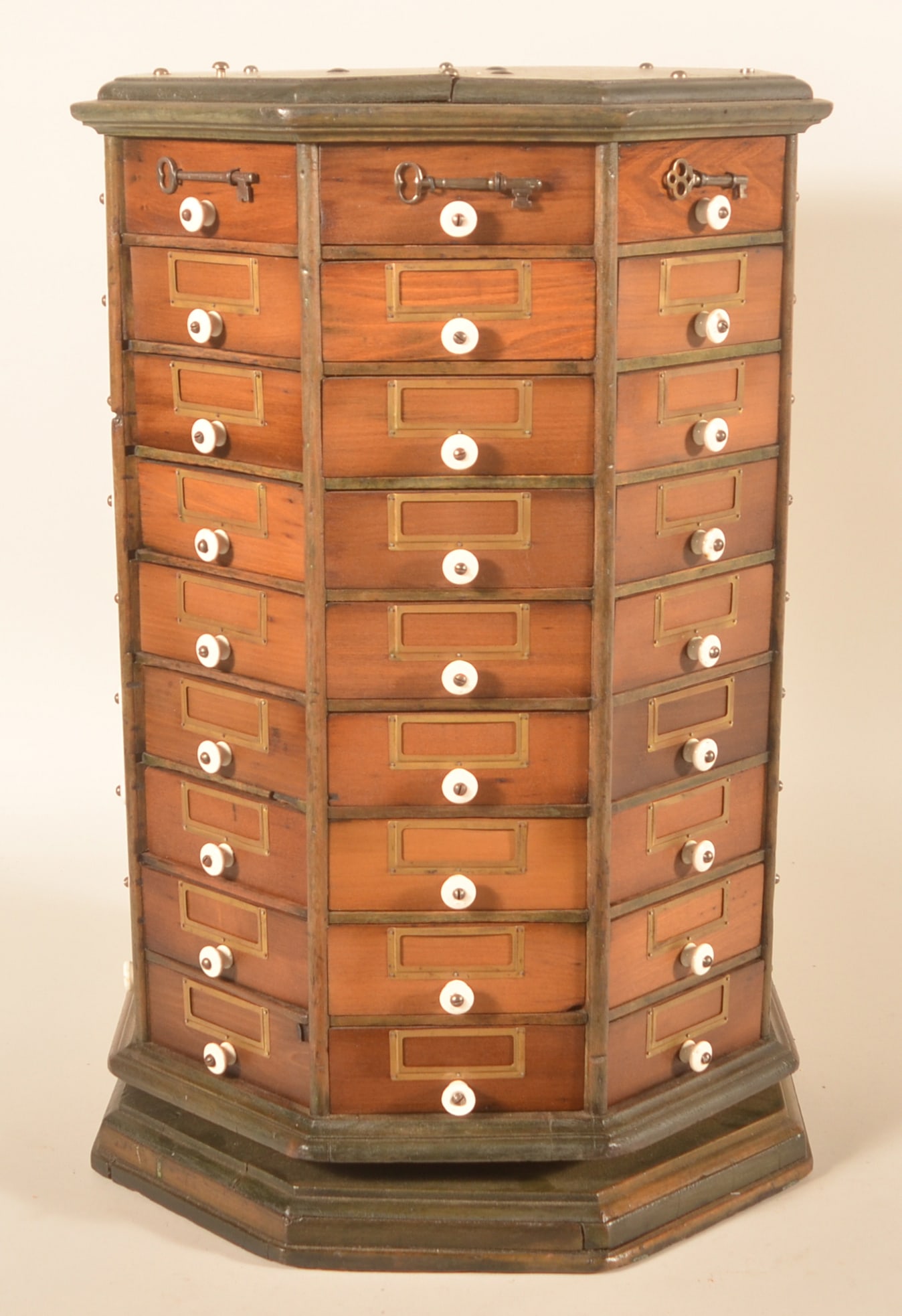Wonderful Countertop Revolving Nuts/Bolts Bin: Typically seen in the very large size, this small countertop bin is perfect for any country store display. Featuring the pie-shaped drawers on a pedestal base, this particular revolving bin is set up