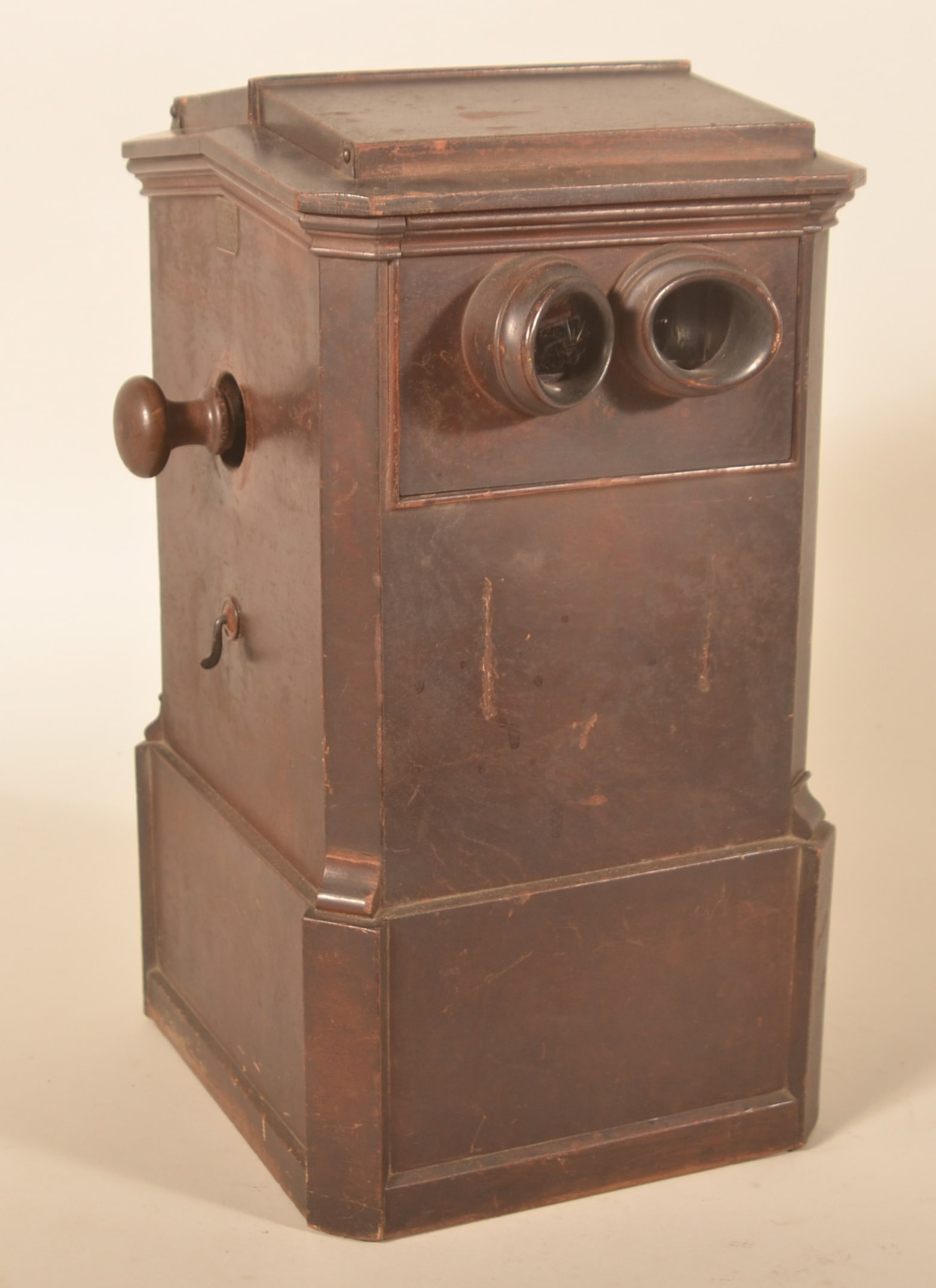 1859 Patent Alex Becker Stereo Viewer: Pre-Civil War mahogany cased viewer with maker's tag on side. Original finish. Viewer features dual lenses. Top opens for access to the stereo view cards. Provenance: The collection of Russell and