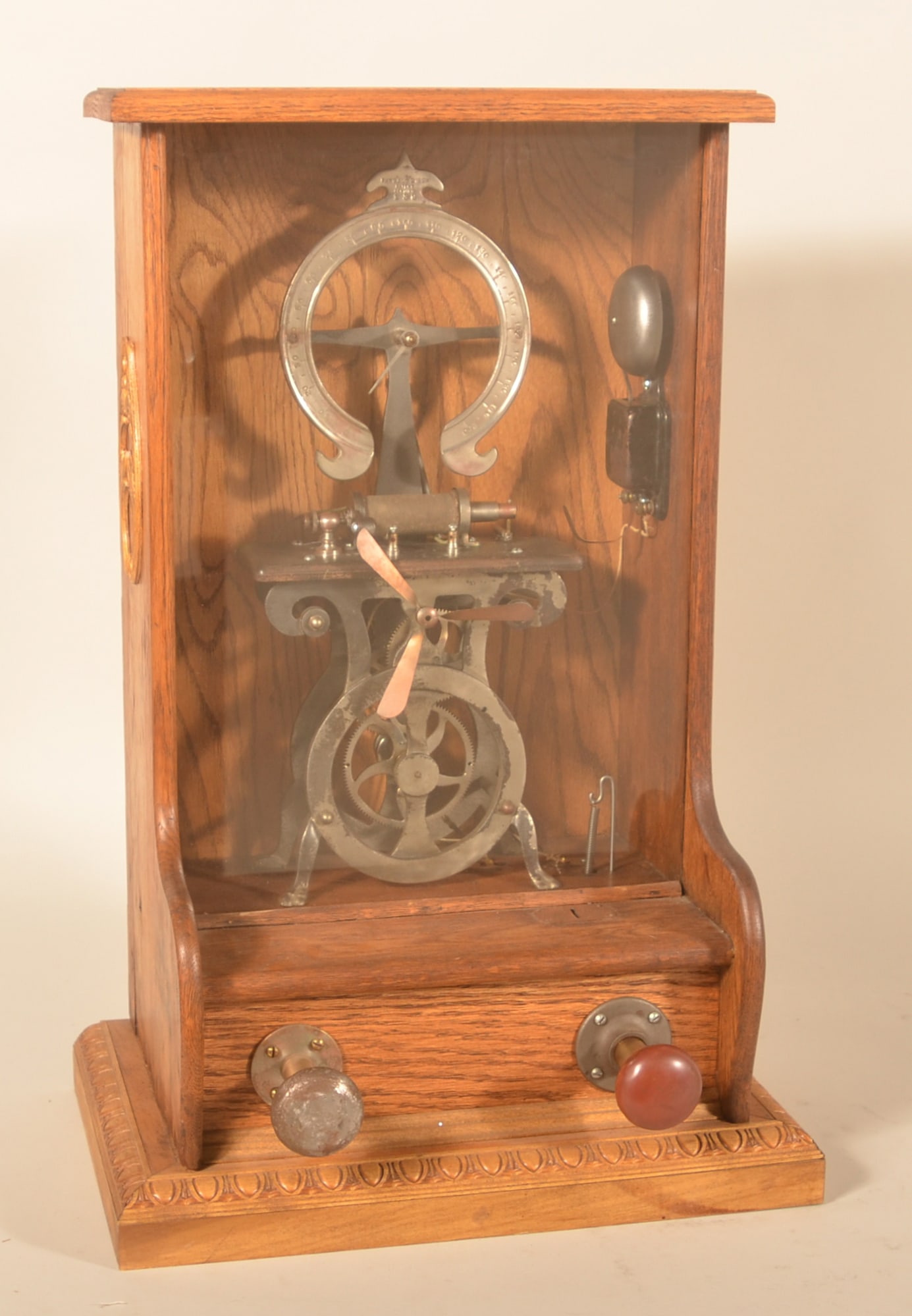 Antique Coin-Op Arcade Shock Machine: Machine operates off a battery in the back. Insert the coin and hold on to the metal knob with your left hand while your right hand adjusts the amount of electricity flowing into your body. The idea