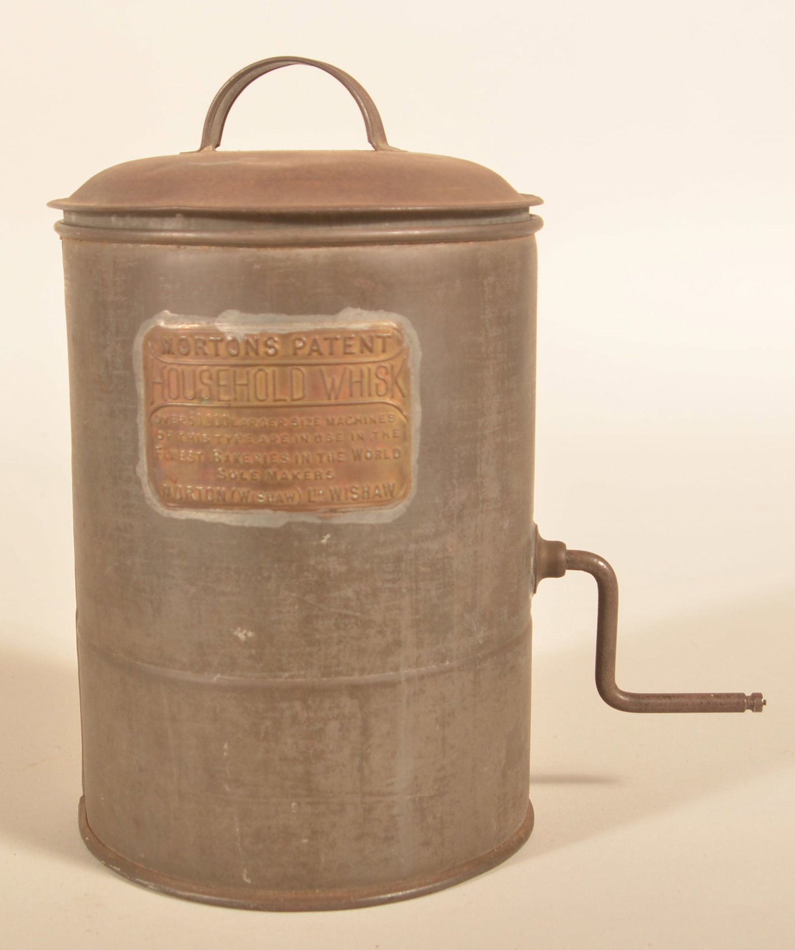 Rare Morton's Patent Household Whisk Tin: Small handheld tin container with interior paddles turned by hand using the side crank. Brass maker's plaque states "Over 50,000 large-size machines of this type are in use in the world. Sole Maker".