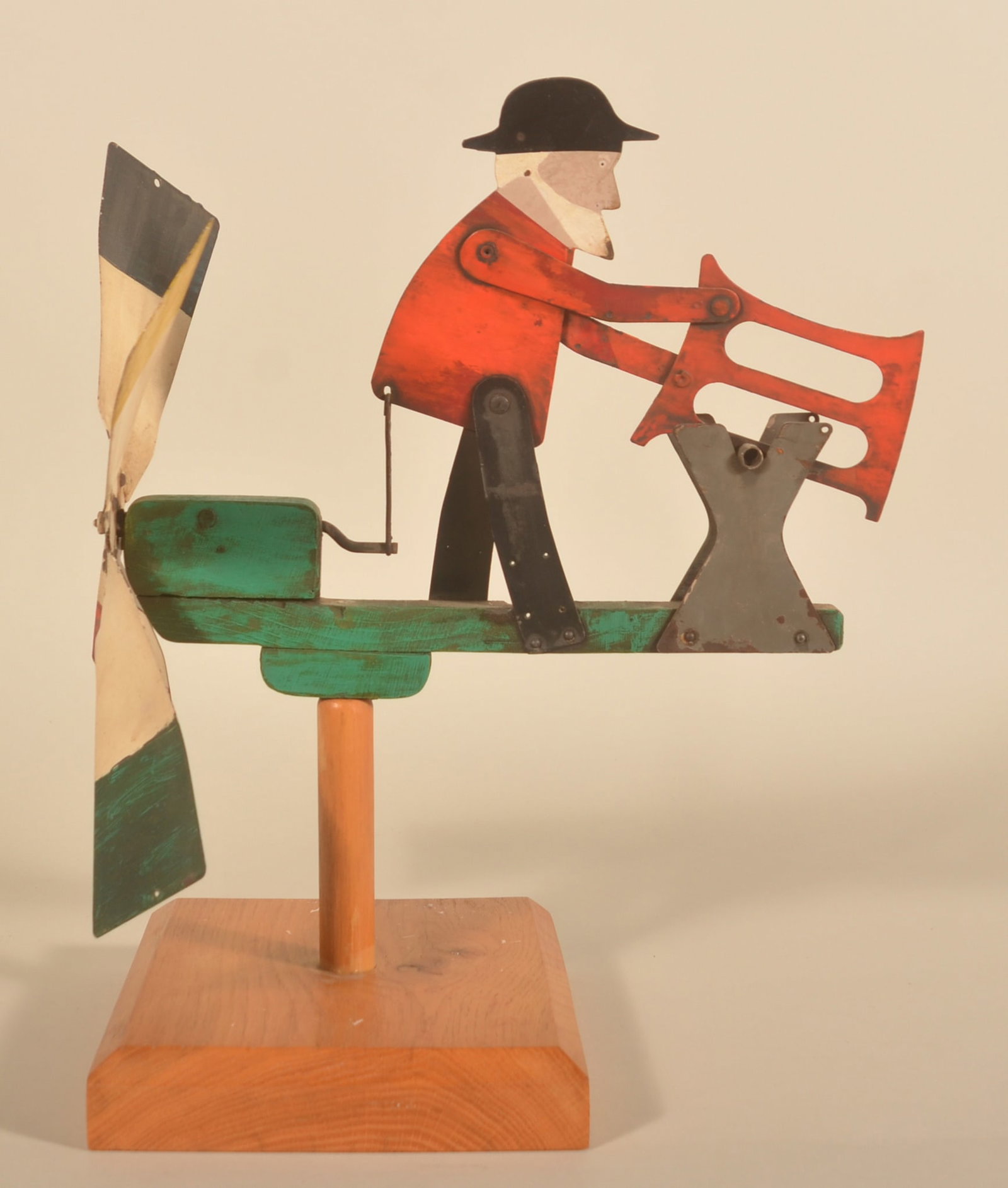 Folky Whirligig Man Sawing Wood: Vintage metal and wood whirligig in vibrant paint. 16 1/2"H