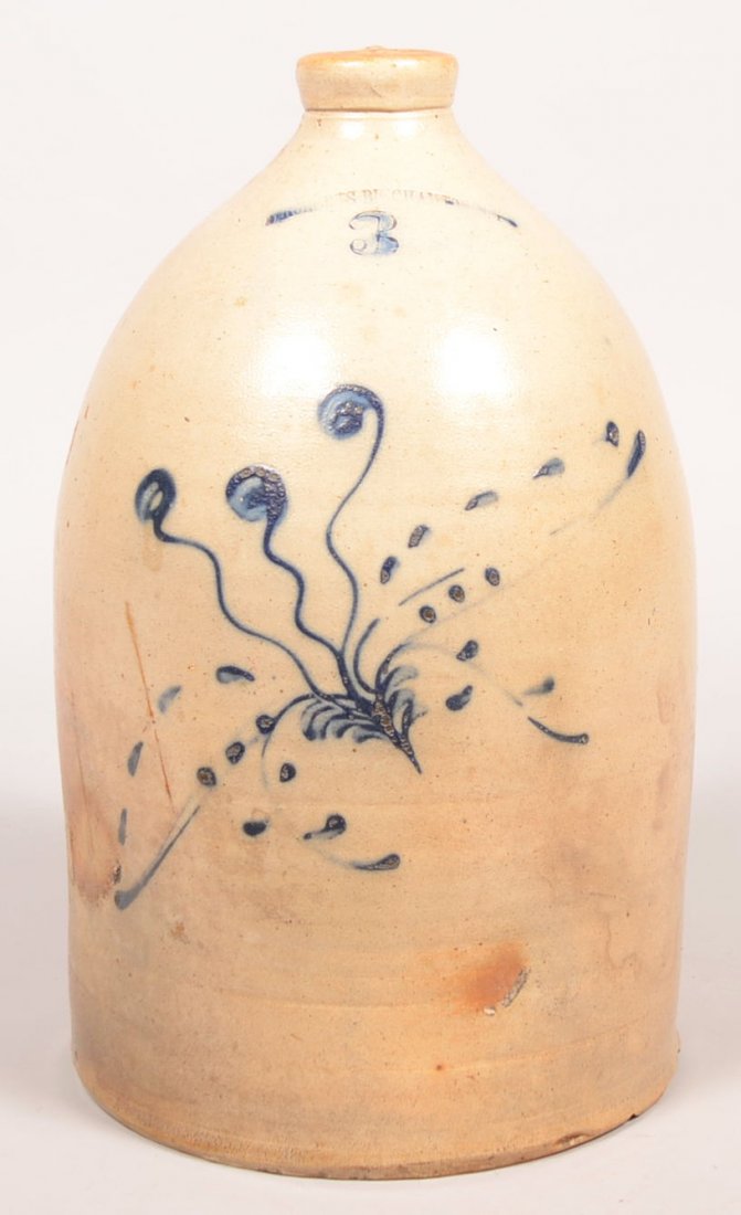 81. WM. Roberts, Binghamton, N.Y. Floral Decorated: 81. WM. Roberts, Binghamton, N.Y. Floral Decorated Three Gallon Stoneware Jug. Cobalt blue stylized floral spray decorations, Ovoid body with Molded spout and loop handle,16"h. Condition: Good with ch