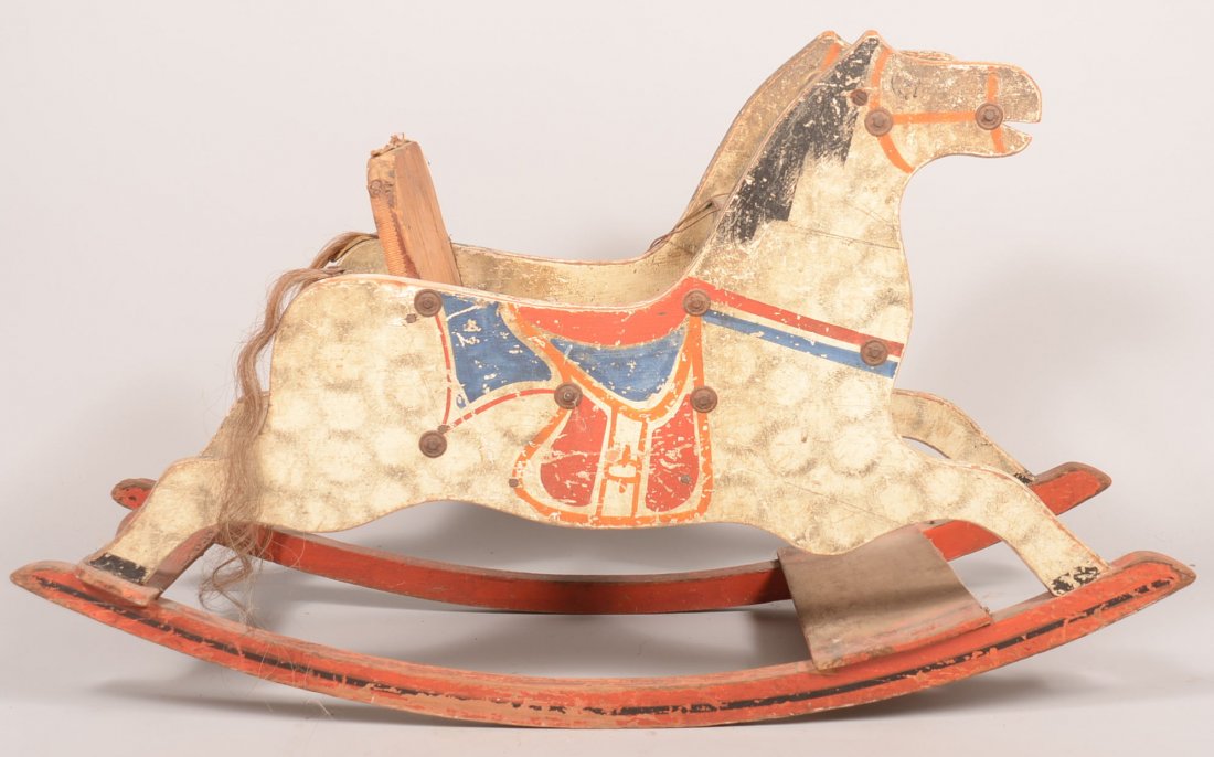 159. Child's Painted Wooden Rocking Horse. Double: 159. Child's Painted Wooden Rocking Horse. Double silhouette form with smoke decorations, painted saddle, rockers painted red with black highlights, wooden padded straw filled seat and front tray,21-/