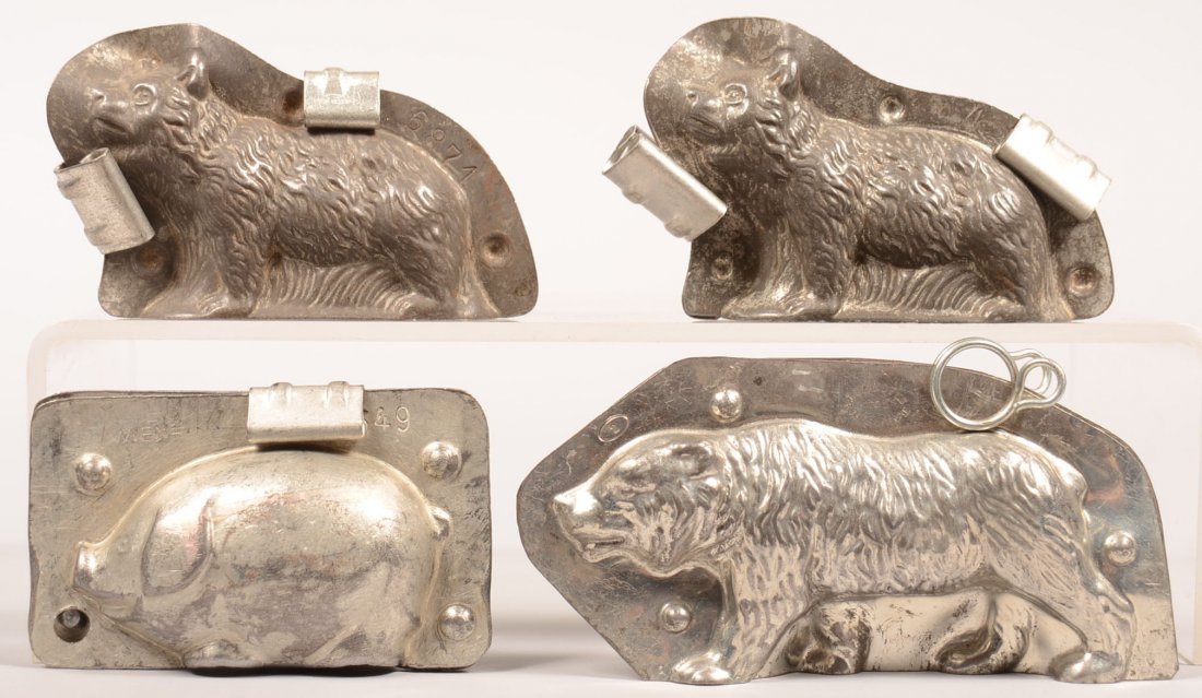 309. Four Animal Chocolate Molds. Two bear looking up: 309. Four Animal Chocolate Molds. Two bear looking up by Reiche, Walking bear by LeTang and standing pig by Reighe, 2-1/2"-3"h. Condition: Good.