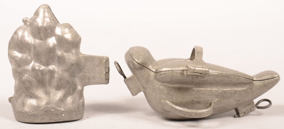 349. Three Little Pigs and Large Dove Pewter Ice Cream: 349. Three Little Pigs and Large Dove Pewter Ice Cream Molds. Pigs #1186 5"h. , Dove is Hinged three part, 3-1/4"h. 6-1/2"l.x 4-3/4"w. Condition: Good.