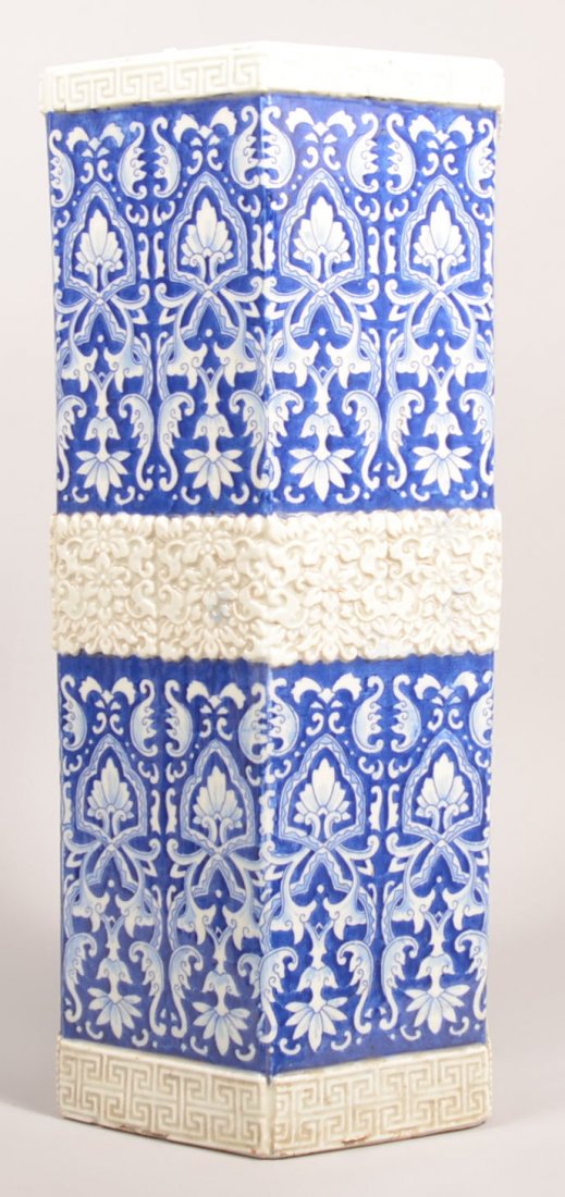 369. Japanese Imari Porcelain Hexagonal Umbrella Stand.: 369. Japanese Imari Porcelain Hexagonal Umbrella Stand. Blue and white scroll and foliate design with embossed geometric rims and floral and foliate raised central band. Good quality, circa. late 19th