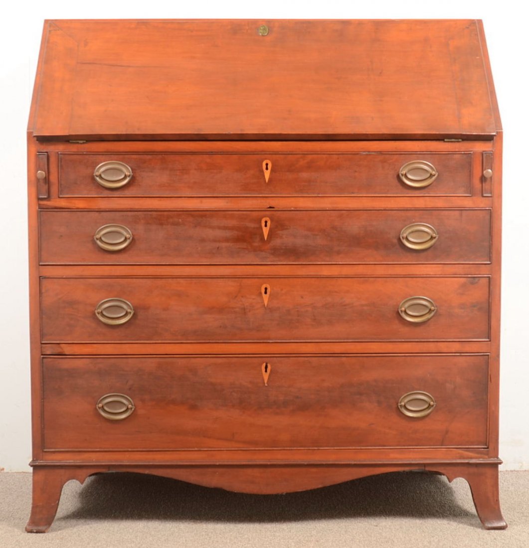 416. Pennsylvania Hepplewhite Cherry Slant-lid Desk,: 416. Pennsylvania Hepplewhite Cherry Slant-lid Desk, Circa. 1790-1810. Lip-molded slant-lid with interior prospect door, flanked by book-end drawers and compartments, four graduated cock-beaded doveta