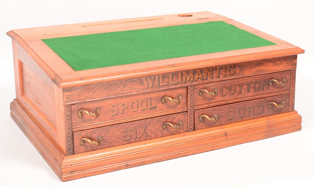 439. Willimantic Oak Case Countertop Spool Cabinet.: 439. Willimantic Oak Case Countertop Spool Cabinet. Felt lined hinged slant lid with pen holder and inkwell, interior compartment and four drawers with original stenciling "Willimantic Spool Cotton Si