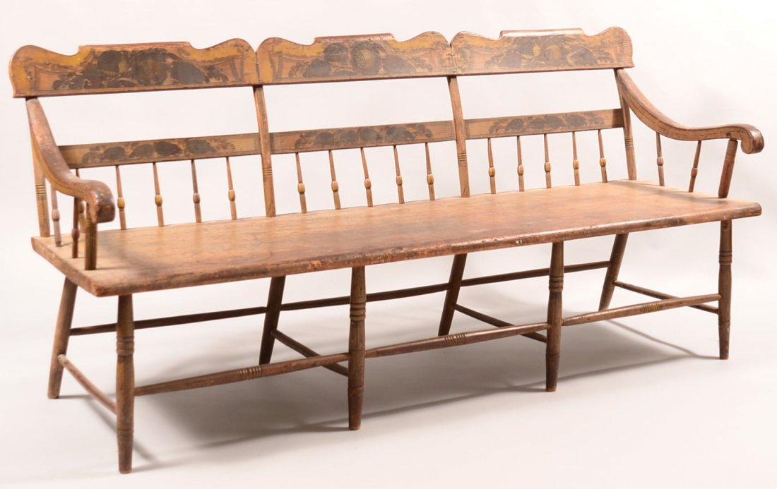 492. Pennsylvania 19th Century Half-spindle Back Plank: 492. Pennsylvania 19th Century Half-spindle Back Plank Seat Settee with scrolled arms. Original worn yellow/brown ground paint with bellflower and foliate decoration. Seat height 17-12", 72" long. Con