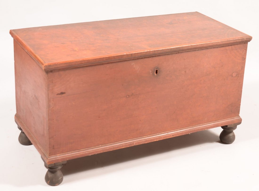 492. Pennsylvania 19th Century Softwood Stipple Paint: 492. Pennsylvania 19th Century Softwood Stipple Paint Decorated Blanket Chest. Molded lid with interior till, wrought iron strap hinges and jaw lock, dovetailed case, molded base and turned feet. 24"h