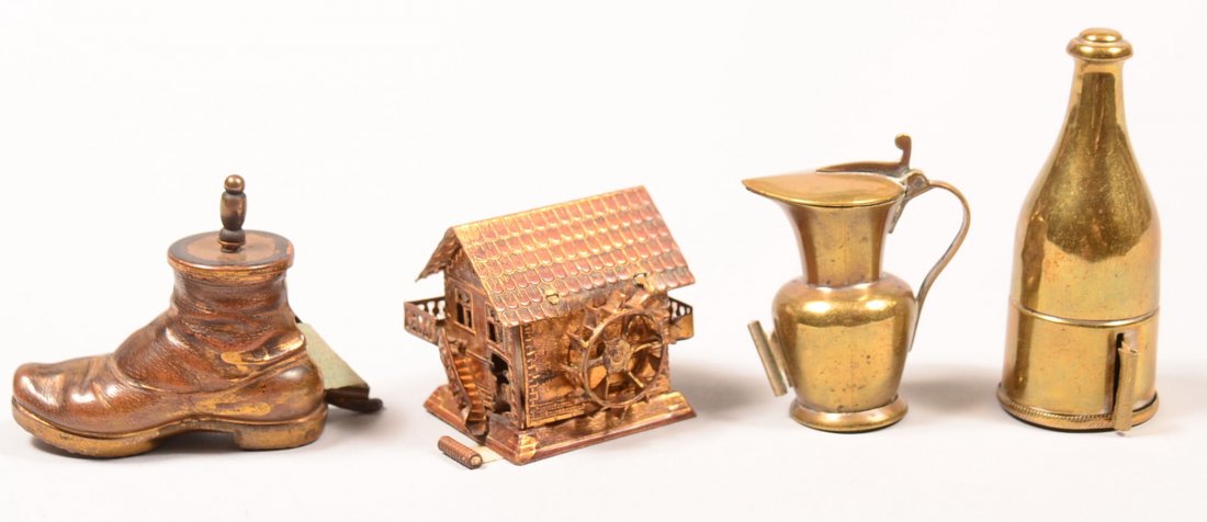 504. Lot of Four Brass Sewing Tape Measures; boot, mill: 504. Lot of Four Brass Sewing Tape Measures; boot, mill house, flagon and bottle with thimble holder. Bottle measures 2-3/4" high. Condition: Good with use wear.