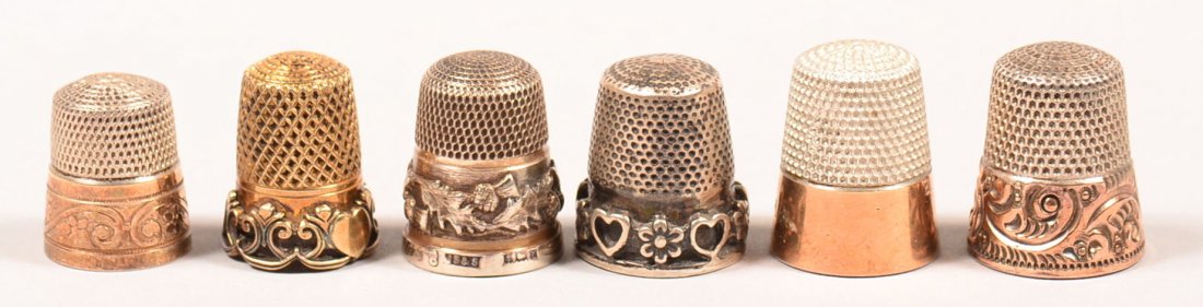 523. Six Various Antique Sterling Silver Thimbles. Some: 523. Six Various Antique Sterling Silver Thimbles. Some with gold flashing and chased decoration. Condition: good with use wear.