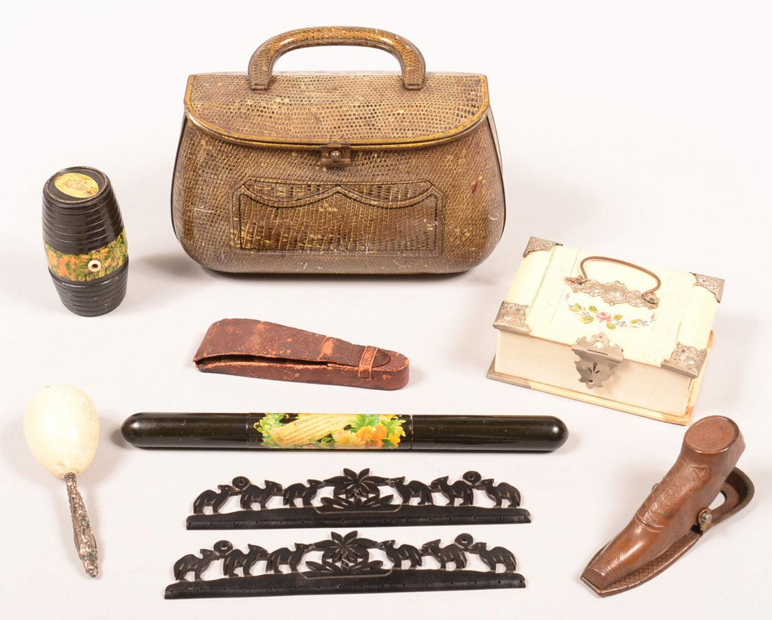 529. Group of Antique and Vintage Sewing Accessories.: 529. Group of Antique and Vintage Sewing Accessories. Including a tin purse, celluloid lid sewing box, boot form clip, needle case, sock darners and more. Condition: good with use wear.