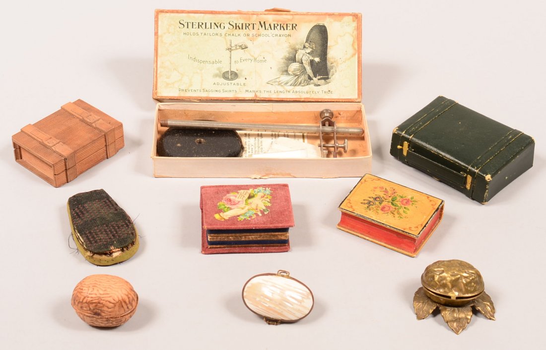 533. Nine Various Sewing Items; Thimble holders, needle: 533. Nine Various Sewing Items; Thimble holders, needle cases, skirt marker, ect.