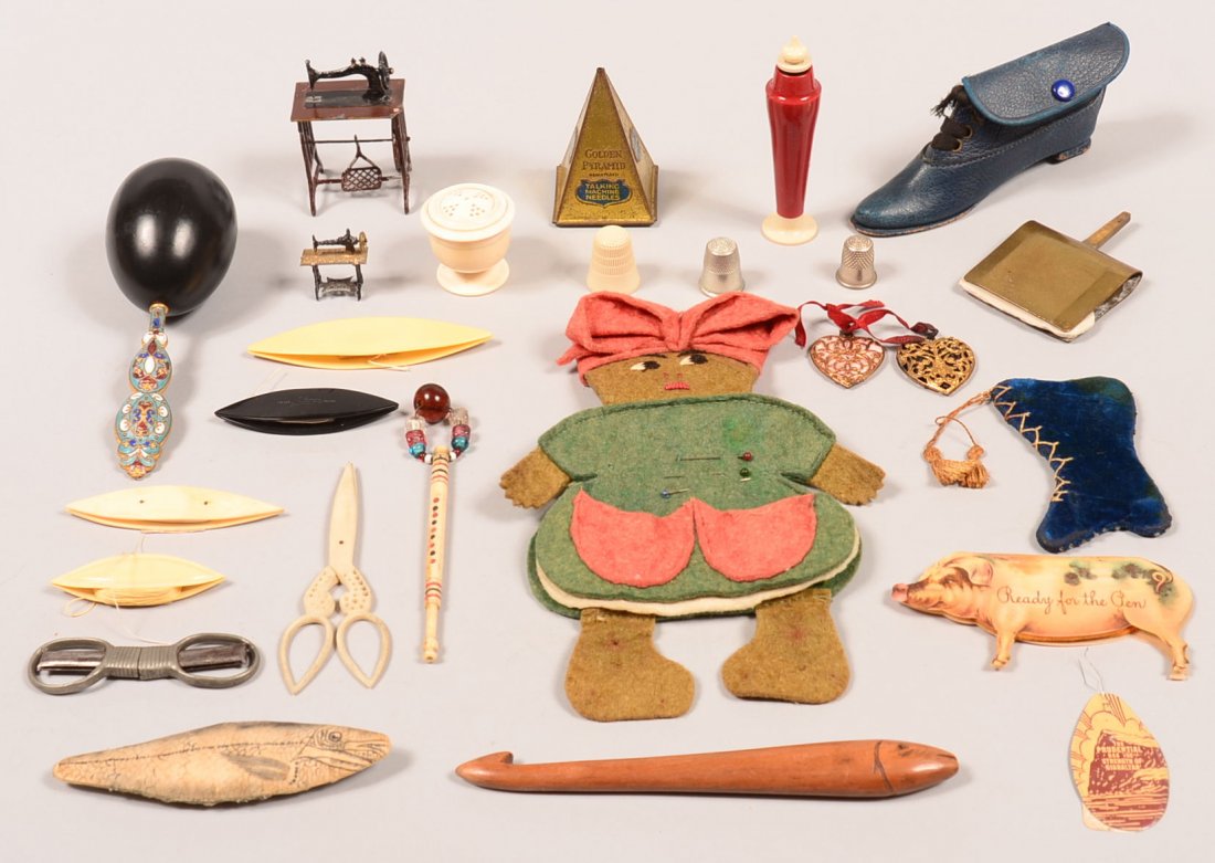 535. Lot of Vintage Sewing Accessories; Cloisonné: 535. Lot of Vintage Sewing Accessories; Cloisonné handled sock darner, bone scissors and thimble, lace bobbin, pin cushions, Mammy felt and more.