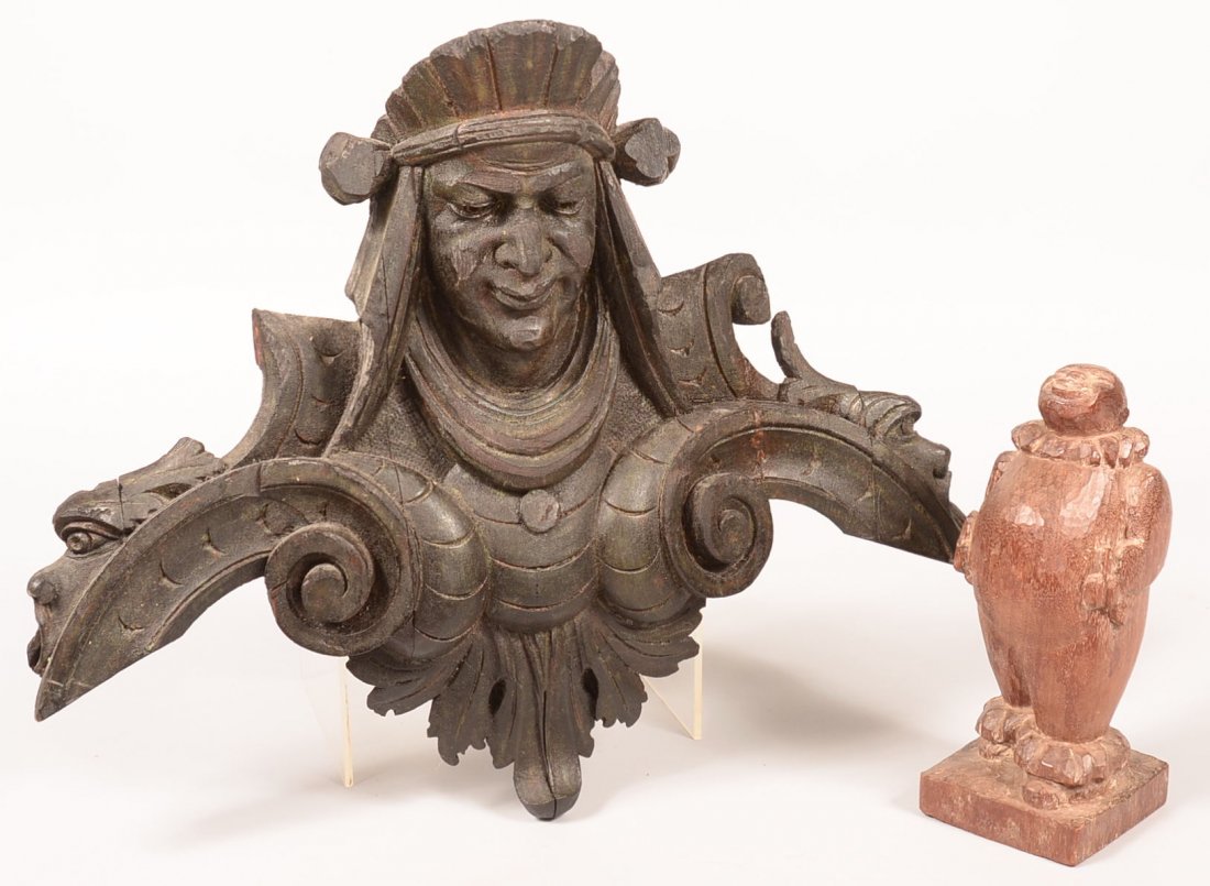 596. Carved Rosewood Clown Sculpture, Circa. 1930-1940.: 596. Carved Rosewood Clown Sculpture, Circa. 1930-1940. 10-1/2"h and a Victorian mask and scroll cornice device, 18"h x 22"w. Condition: clown sculpture is good, cornice has break repairs.