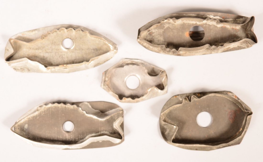 609. Five Various Animal Tin Cookie Cutters. Fishes and: 609. Five Various Animal Tin Cookie Cutters. Fishes and mouse,3-1/4"l.-5-3/4"l. Condition: Good with use wear.