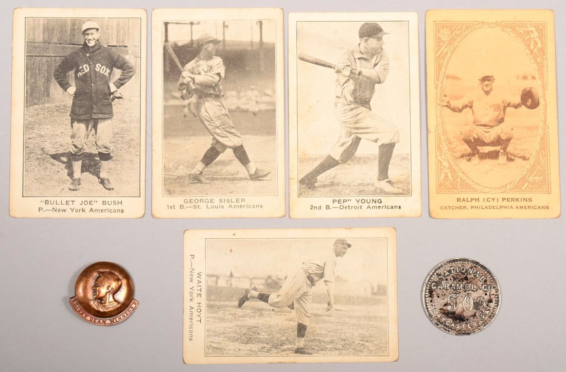 Five cards plus one token and one pinback badge: One: Five cards plus one token and one pinback badge: One 1922 E-120 American Caramel card: Cy Perkins of Philadelphia card, four 1922 E-121 American Caramel cards: "Bullet Joe" Bush of New York, Waite Hoy