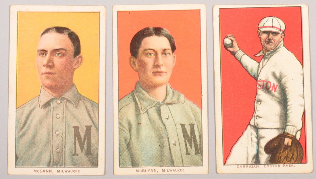 Three T-206 white border cards circa 1909-1911. The: Three T-206 white border cards circa 1909-1911. The first is Dan McGann of Milwaukee with a Piedmont back. The second is Stoney McGlynn of Milwaukee with a Piedmont back. The third is Bill Carrigan of