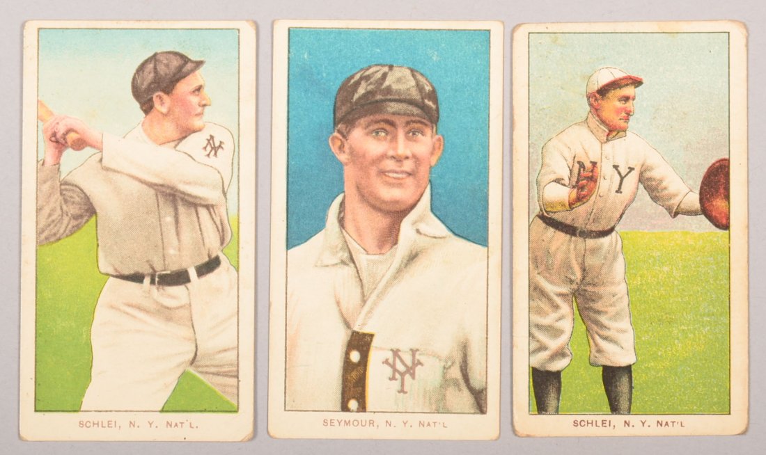 Three T-206 white border cards circa 1909-1911. The: Three T-206 white border cards circa 1909-1911. The first is Admiral Schlei of New York with a Piedmont back, batting. The second is Cy Seymour of New York with a Sweet Caporal back, portrait. The thi