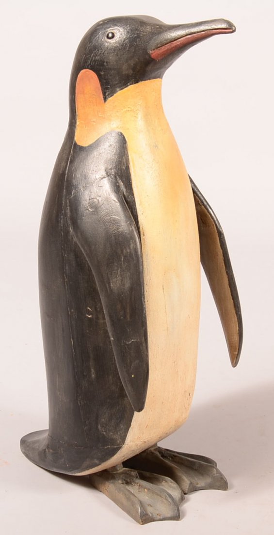 Miles Wooden Penquin Sculpture. Carved and realistic