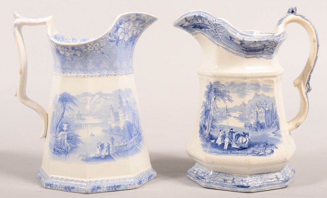 Two Blue Scenic Transfer Ironstone China Paneled Water: Two Blue Scenic Transfer Ironstone China Paneled Water Pitchers. "Delaware" pattern, 9-1/2"h. and "Union" pattern by Venables & Baines, 9-3/4"h. Condition: Delaware pitcher has tiny edge chips, Union 