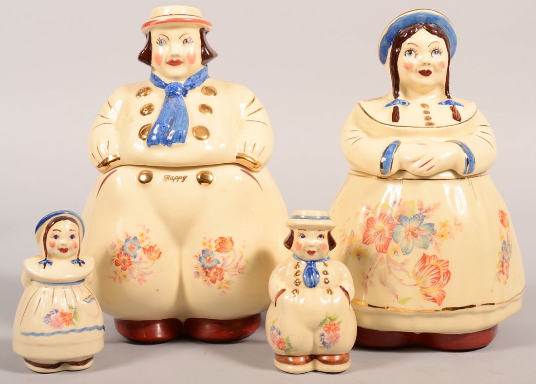 Four Pieces of Shawnee Pottery; Dutch Boy and Dutch: Four Pieces of Shawnee Pottery; Dutch Boy and Dutch Girl cookie jars, both 12"h. and salt and pepper shakers, 5-1/4"h. Condition: Very good.