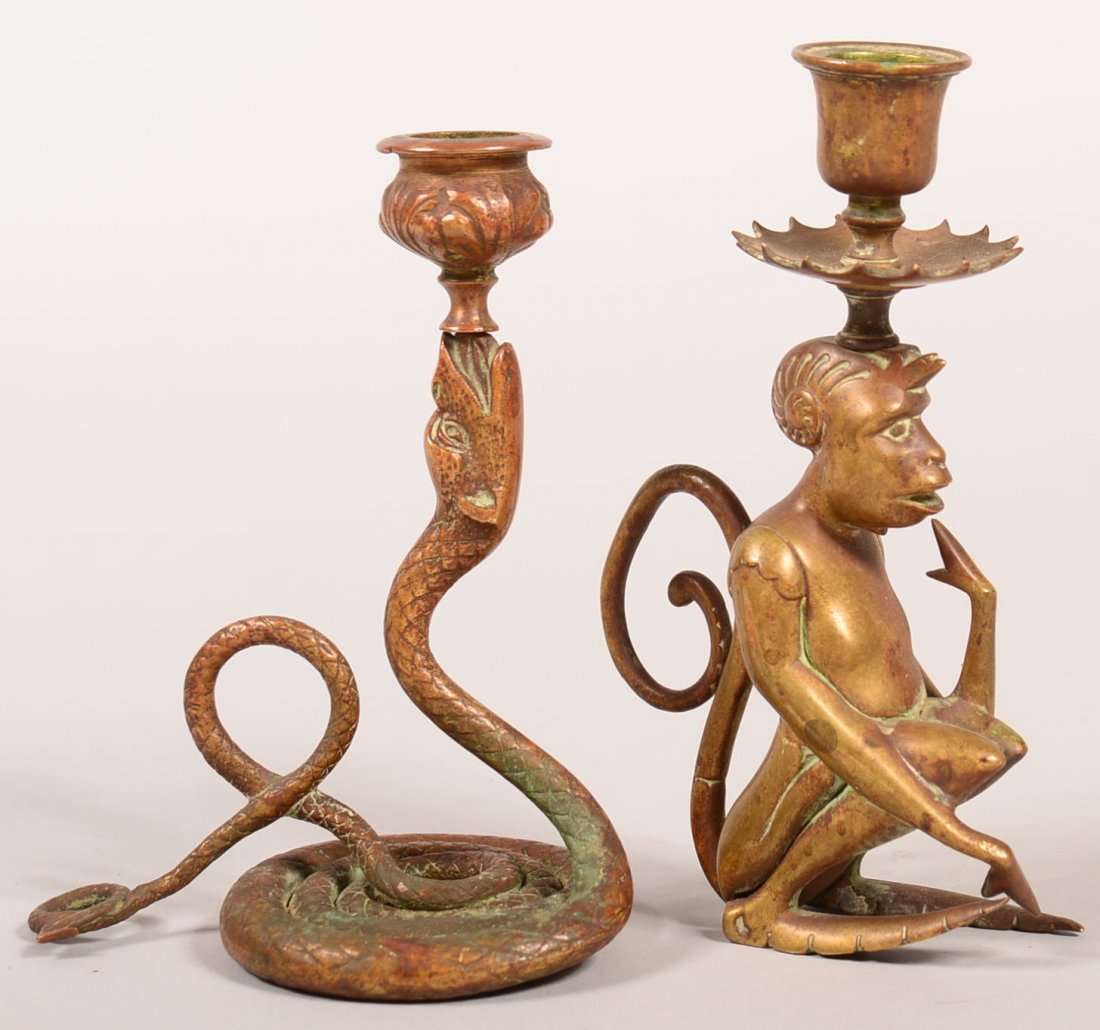 Two Single Brass Figural Candlesticks. Coiled snake: Two Single Brass Figural Candlesticks. Coiled snake with snake's mouth holder candle socket, tail's looped for finger grip, Monkey with candle socket and drip tray mounted on head, monkey's tail loope