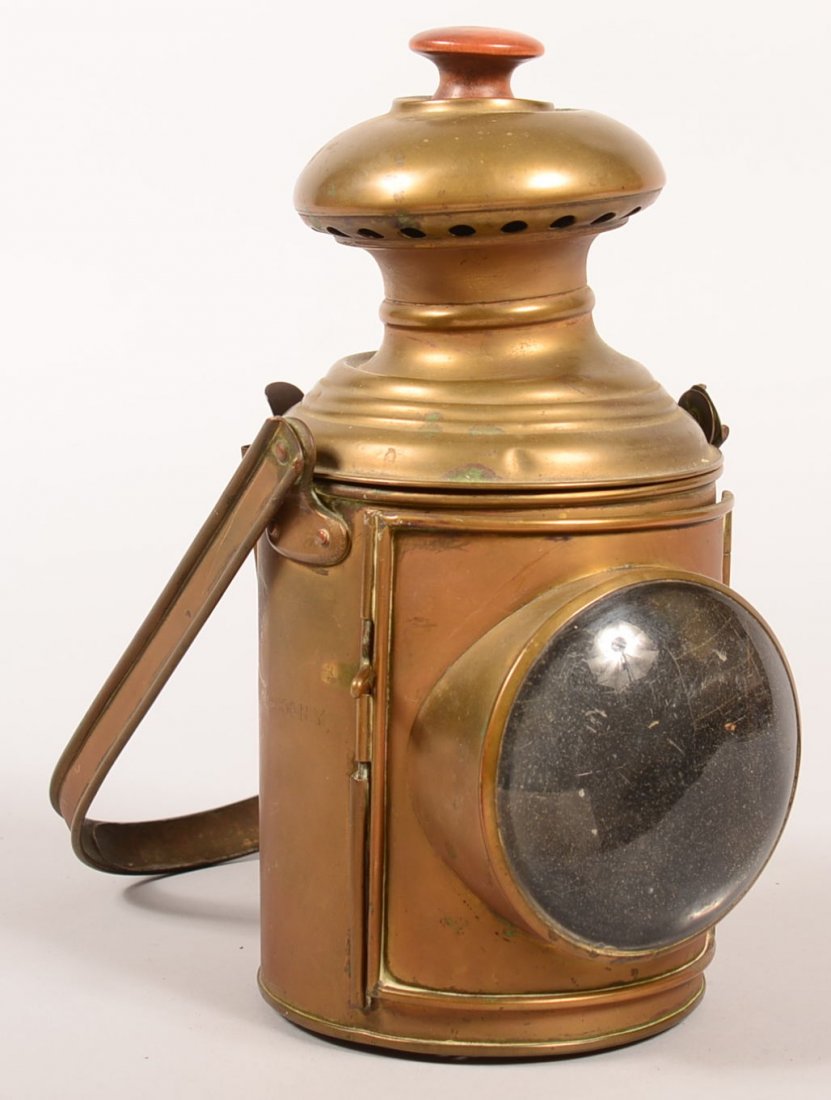 Brass Nautical Lantern with bull's eye lens. Green and: Brass Nautical Lantern with bull's eye lens. Green and red panels, large swing handle, marked Uslss Walton Bros. N.Y. 10-1/2"h with out, missing interior burner, Condition: Good, missing interior burn
