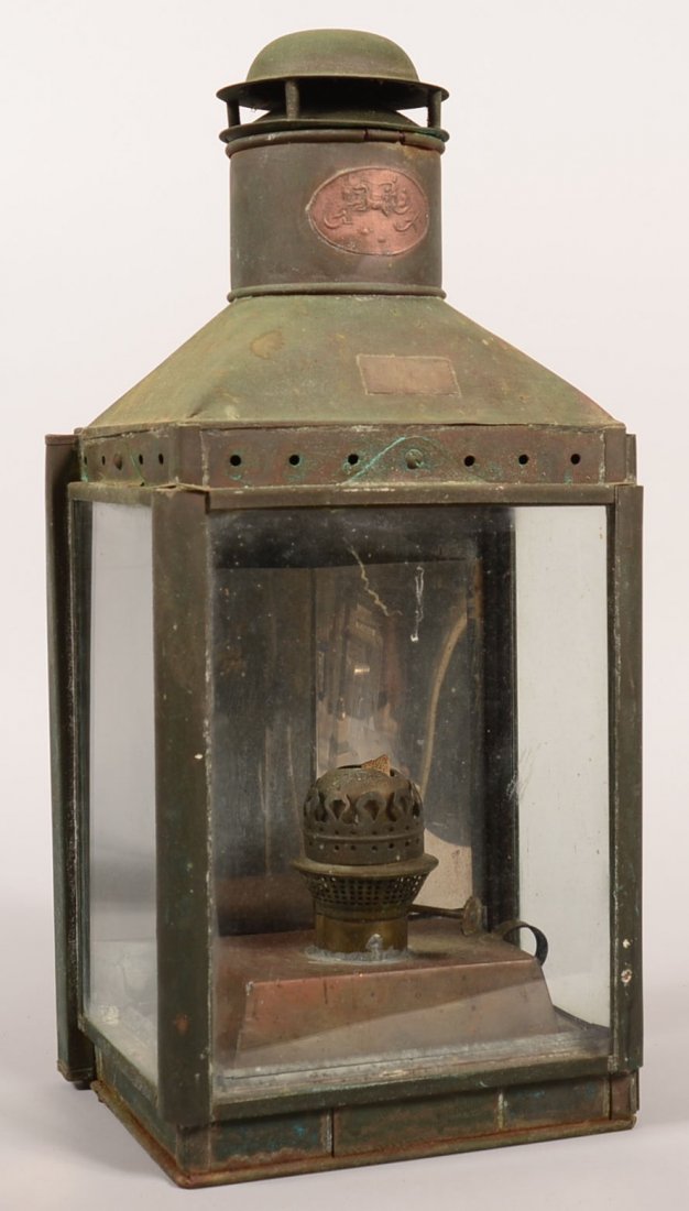 S.S. Nieuw Amsterdam Brass Ship Lantern. Front beveled: S.S. Nieuw Amsterdam Brass Ship Lantern. Front beveled glass panel, galvanized tin interior with reflector, brass receptacle with burner, thumbwheel marked, Sherwoods Ltd B. Ham England, slide door on