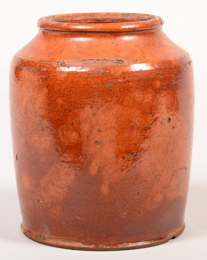 19th Century Glazed Redware Storage Jar. Mottled glaze,: 19th Century Glazed Redware Storage Jar. Mottled glaze, 6"h. Condition: Good with use and wear chips.