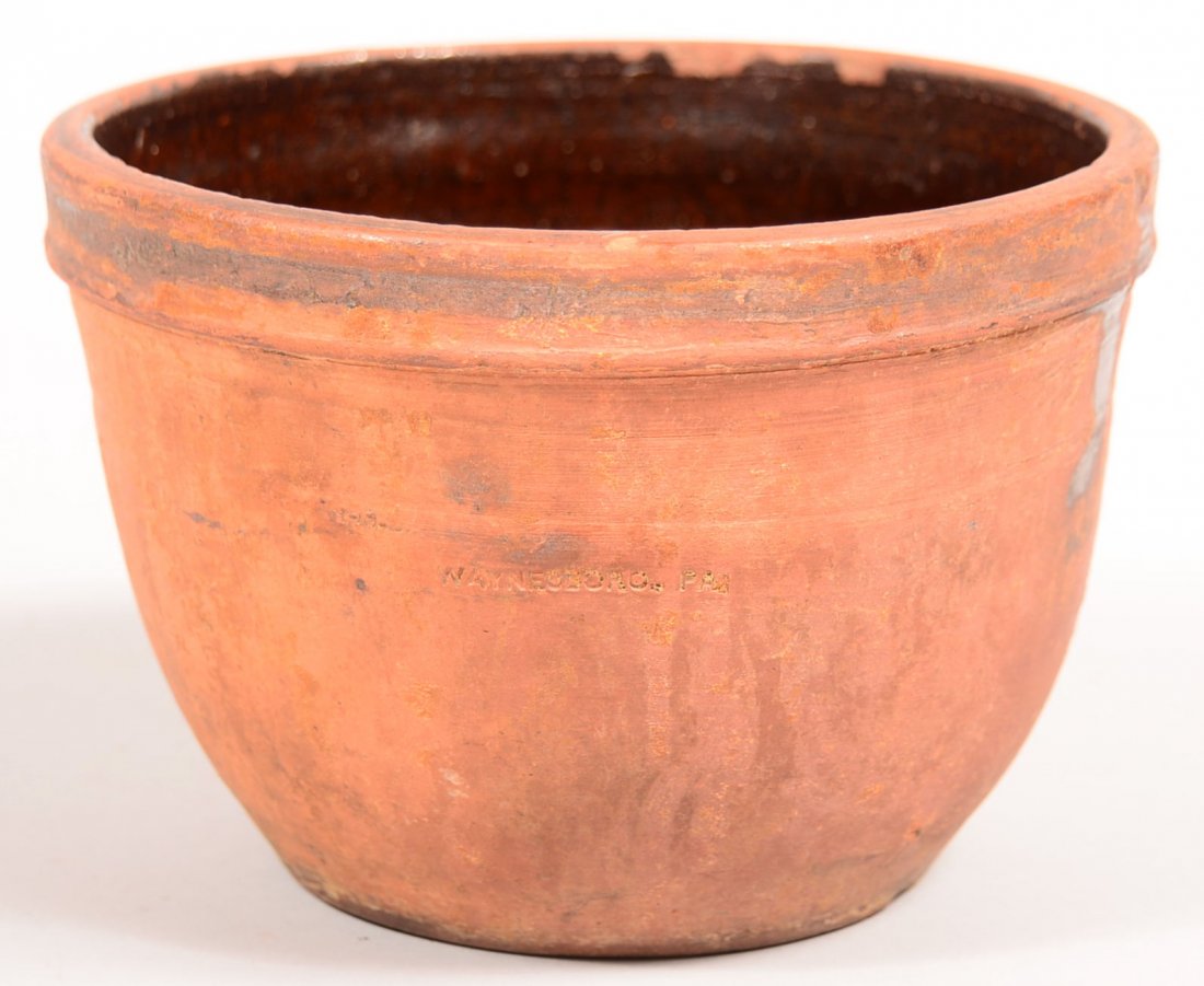 Waynesboro, Pa. Redware Storage Jar with interior: Waynesboro, Pa. Redware Storage Jar with interior glaze, molded rim, 4-1/2"h. Condition: Good with interior rim chips.