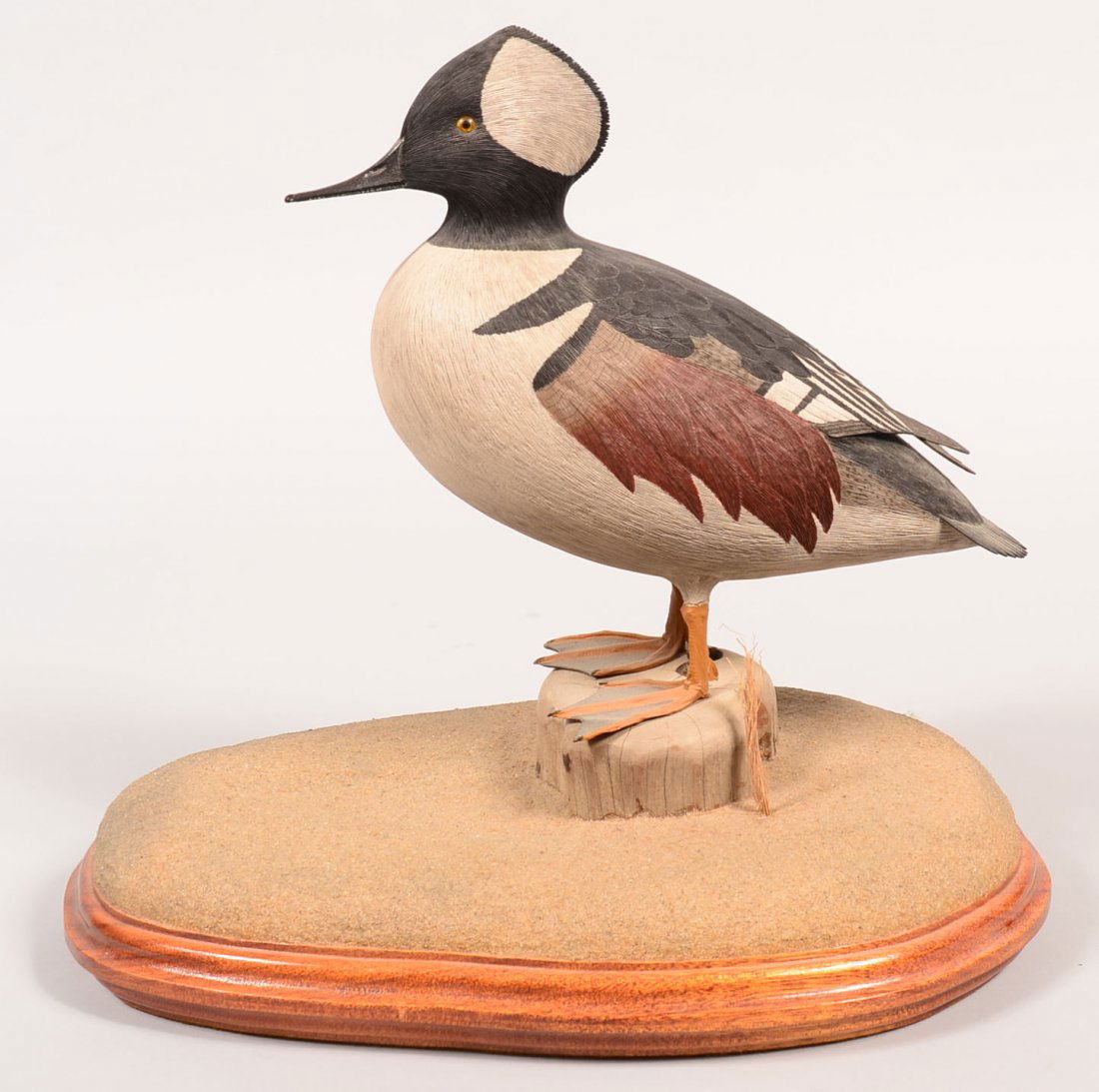 Jeff Jester Bufflehead Duck Carving. Hand carved and: Jeff Jester Bufflehead Duck Carving. Hand carved and realistic painted on platform base, signed Jeff Jester Chincoteague, Va.1983, 15"h. Condition: Very good.