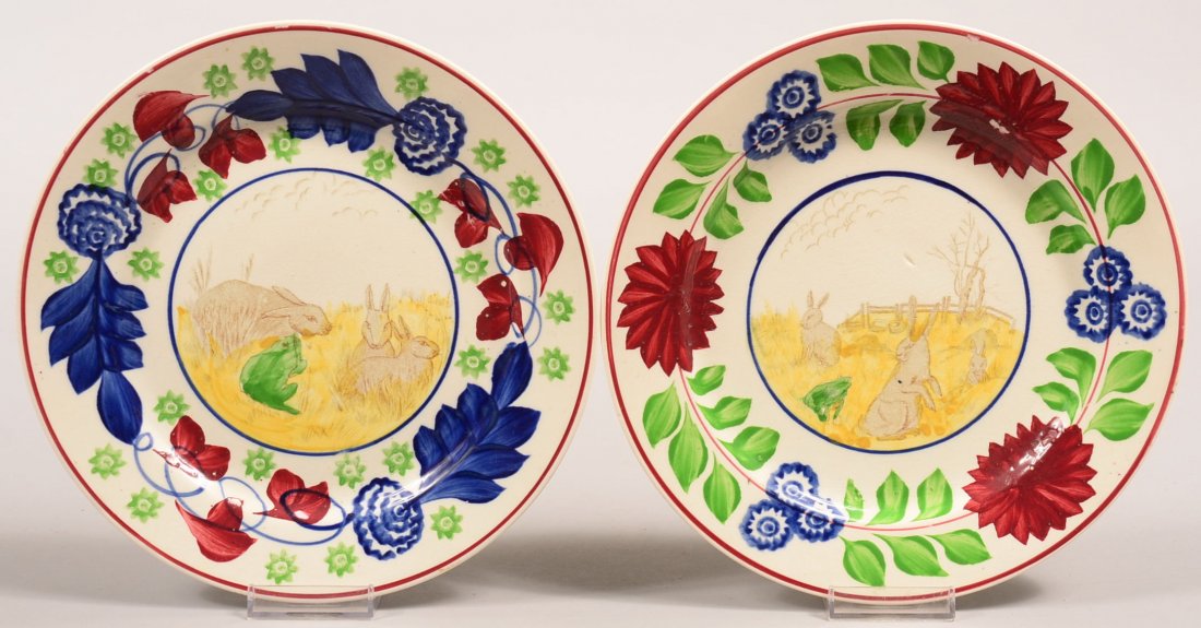 Two Rabbitware with frog Stick Spatter Ironstone China: Two Rabbitware with frog Stick Spatter Ironstone China Plates. Central rabbit and frog transfer scenes with variant polychrome stick spatter borders, 9-1/8" diam. Condition: Very good, no damage.