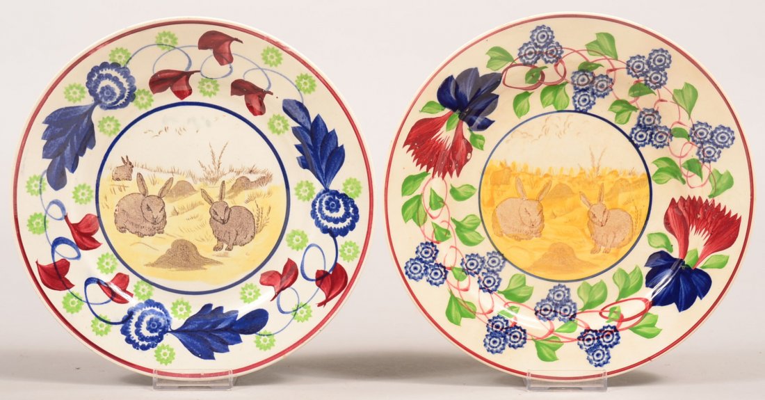 Two Rabbitware Stick Spatter Ironstone China Plates.: Two Rabbitware Stick Spatter Ironstone China Plates. Central rabbit and landscape transfer scenes with variant polychrome stick spatter borders, 9-1/8" diam. Condition: Very good, no damage.