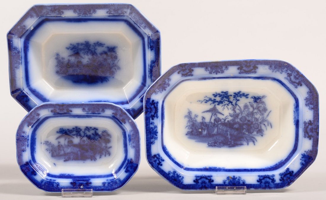 Three Flow Blue "Amoy" Pattern Ironstone China Open: Three Flow Blue "Amoy" Pattern Ironstone China Open Vegetable Bowls by Davenport. 8-1/8", 10-3/8" and 11-3/8" wide. Condition: 10-3/8" bowl has chip repairs on edges, other two are good, no damage.