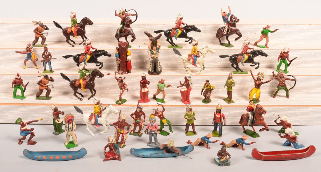 Grouping of England Western Figures. Painted cast metal: Grouping of England Western Figures. Painted cast metal including various makers Charbens, Britain's, Timpo and etc. mostly Indians, 1" to 3-1/2"h. Condition: Good with use wear.