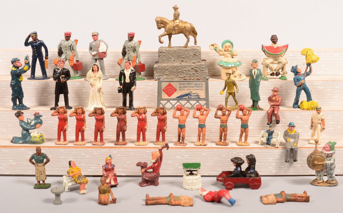 Grouping of Painted Cast Metal Figures. Including bride: Grouping of Painted Cast Metal Figures. Including bride and groom, sports figures, train related figures, 1-1/4" to 4-1/2"h. Condition: Good with use wear.