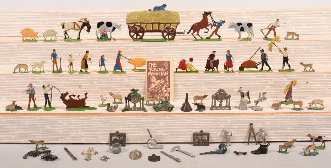Grouping of German and Cracker Jack Figures. Painted: Grouping of German and Cracker Jack Figures. Painted cast metal people and animals, tallest 2-1/2"h. Condition: Good with use wear.