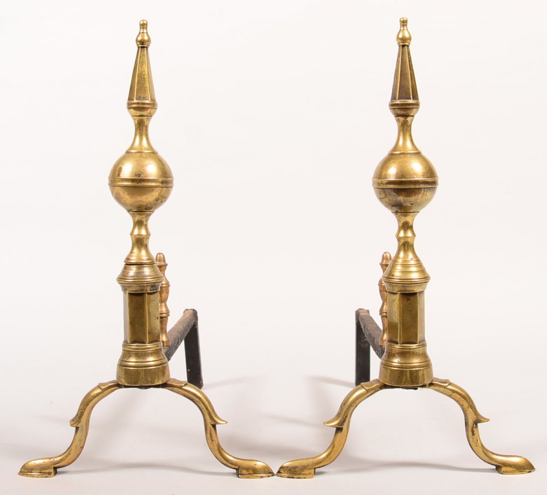 Pair of Brass Steeple Top Andirons with spur legs and: Pair of Brass Steeple Top Andirons with spur legs and slipper feet. 17"h. Condition: Very good.