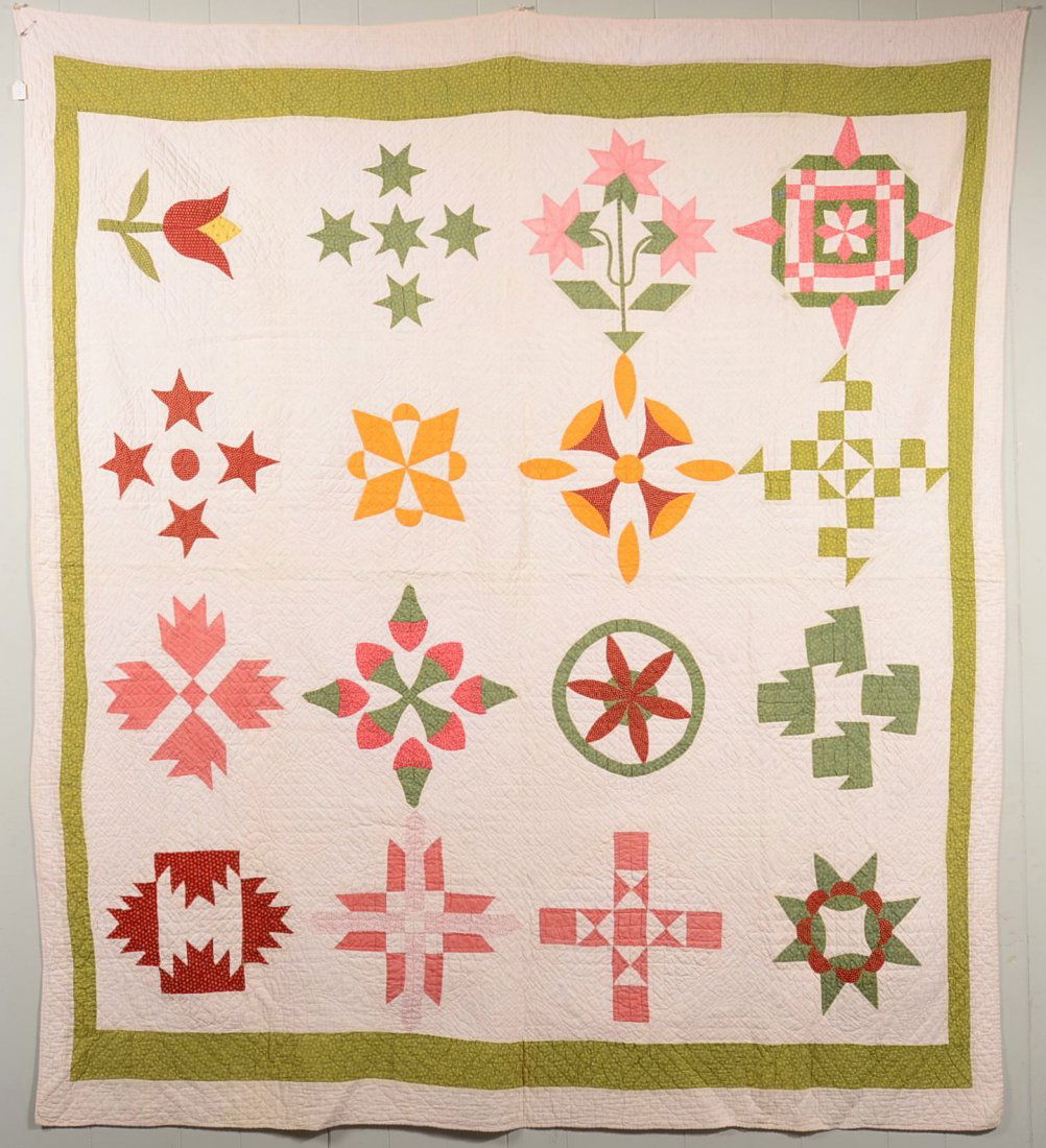 Pennsylvania Sampler Quilt. Having sixteen different: Pennsylvania Sampler Quilt. Having sixteen different patterns blocks, pieced and quilted, green and white border, Late 19th or early 20th century, 67" x 74", Condition: Good.