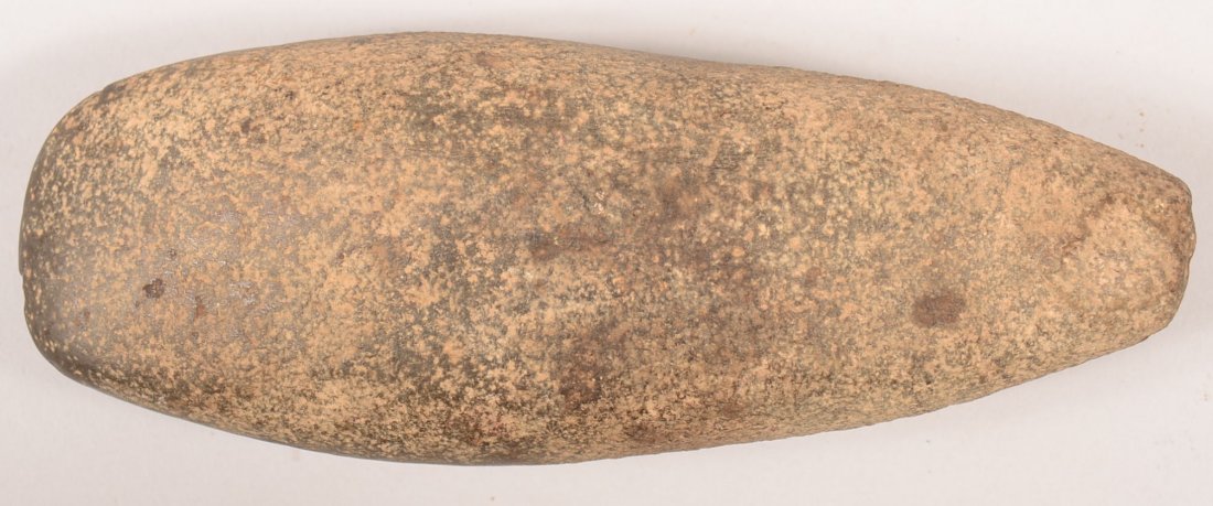 A pre-historic Indian celt 7 1/4" long: A pre-historic Indian celt 7 1/4" long