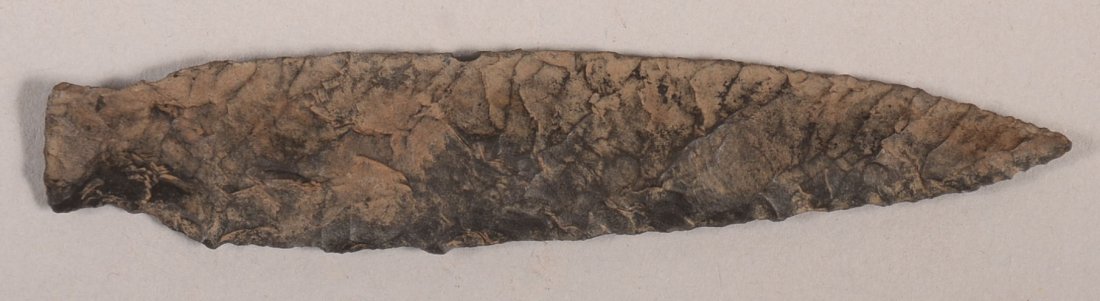 A pre-historic "Elk River" flint point - slender and: A pre-historic "Elk River" flint point - slender and sharp. Ex. S.B. Sisemore coll. - 3-1/2" long