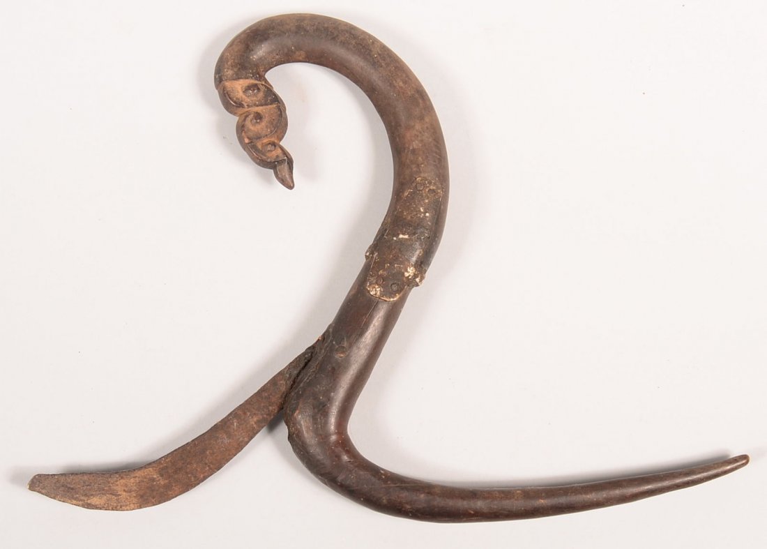 An old Phillipine Island knife with curved steel blade: An old Phillipine Island knife with curved steel blade and curved wood handle