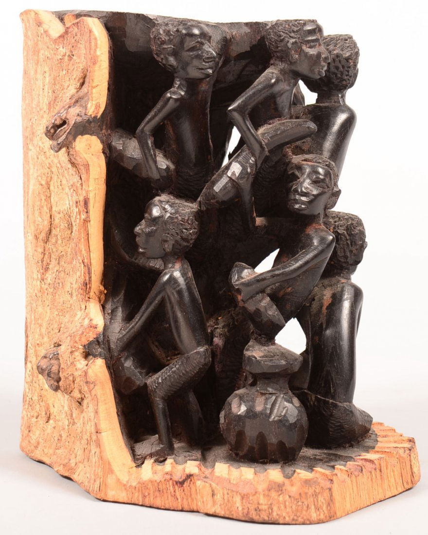 A contemporary ebony wood carving of intertwined human: A contemporary ebony wood carving of intertwined human figures - 7 3/4" tall - Good